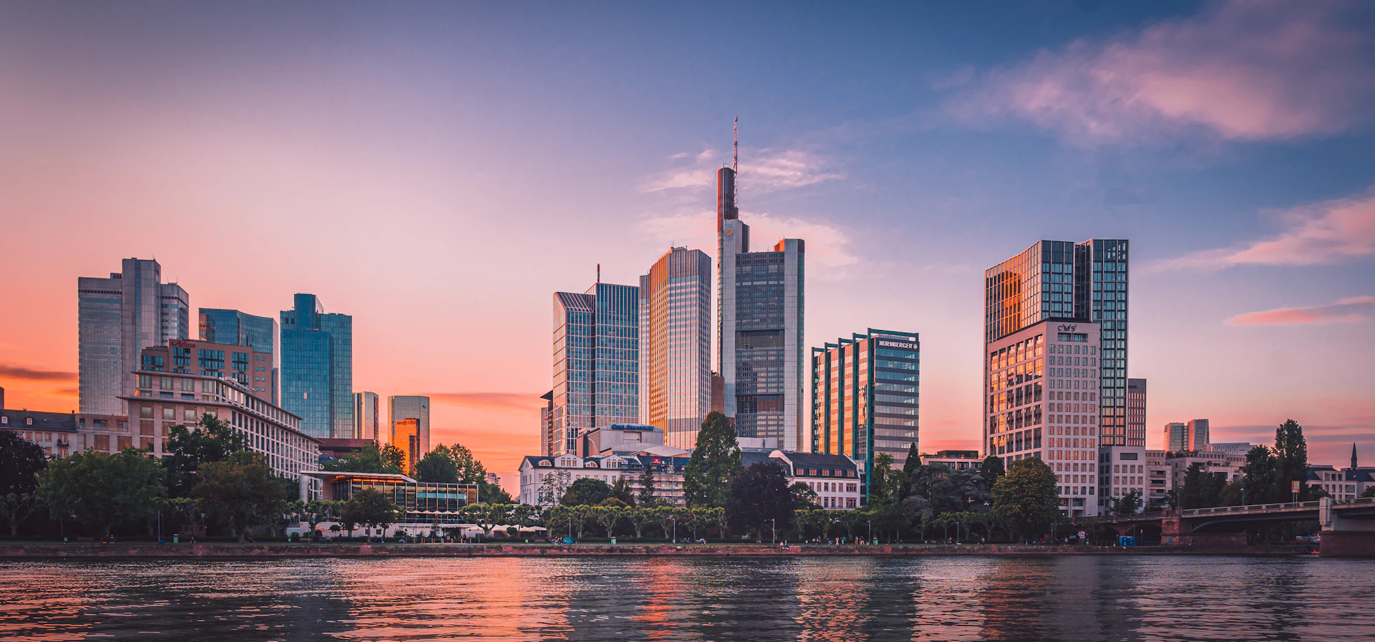 Frankfurt am Main skyline across the river Main at dusk
